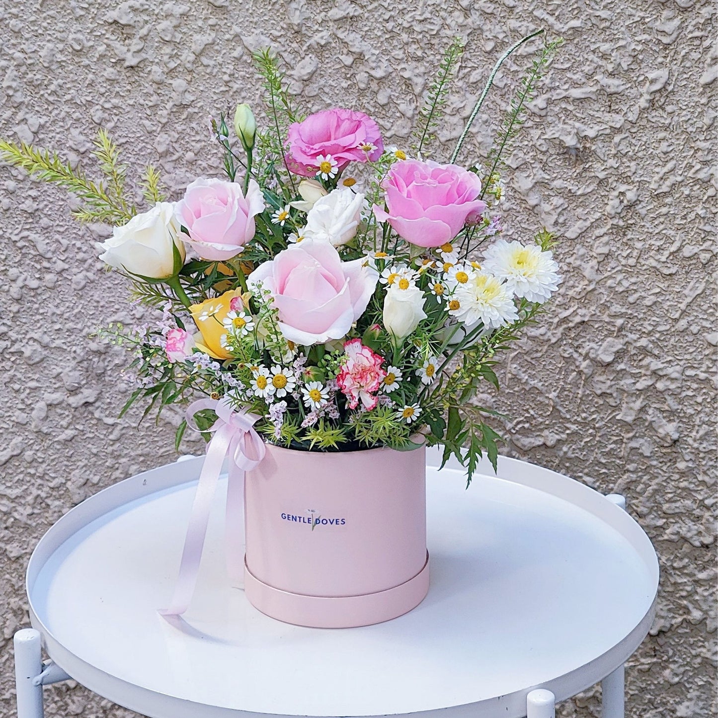 Assorted Pink and Green Foliage in Small Box Arrangement