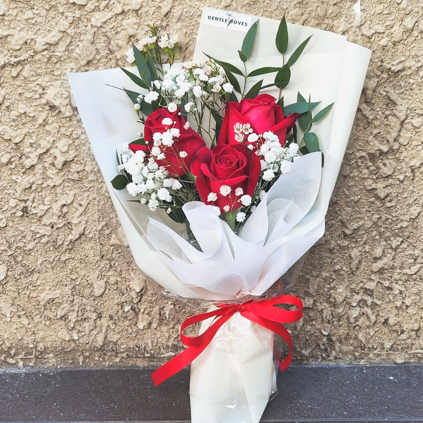 Three Red Roses with Gypsophila and Eucalyptus Bouquet