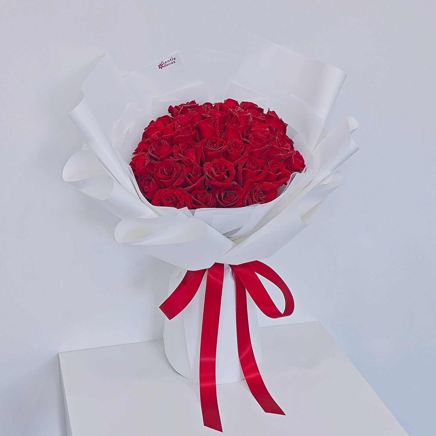 Forty Red Roses in White Paper Bouquet
