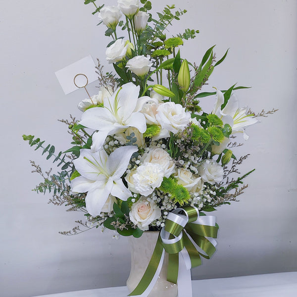Assorted White Flowers with Lilies and Green Foliage in Extra Large Ceramic Vase Arrangement