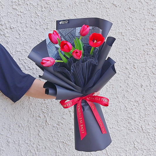 Six Red Tulips in Black Paper Bouquet