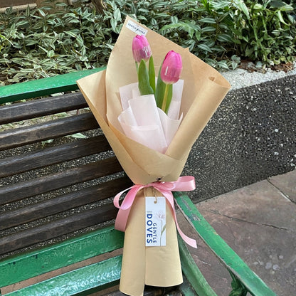 Two Vivid Pink Tulips in Kraft Paper Bouquet