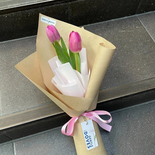 Two Vivid Pink Tulips in Kraft Paper Bouquet
