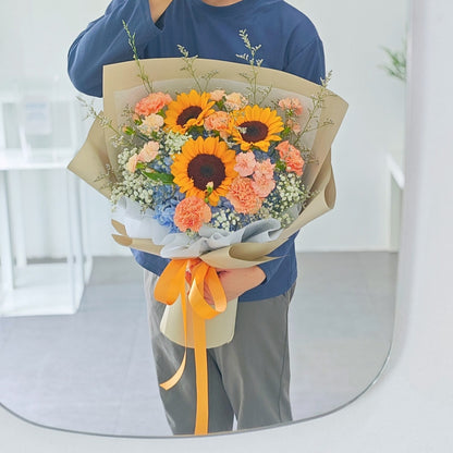 Three Sunflowers with Blue Hydrangeas and Assorted Orange Flowers Large Bouquet