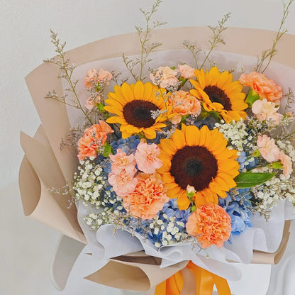 Three Sunflowers with Blue Hydrangeas and Assorted Orange Flowers Large Bouquet