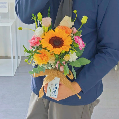 Sunflower with Assorted Warm Flowers in Medium Vase Arrangement