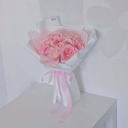 Twenty Soft Pink Roses in White Paper Bouquet