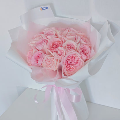 Twenty Soft Pink Roses in White Paper Bouquet