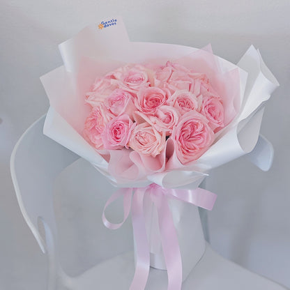 Twenty Soft Pink Roses in White Paper Bouquet