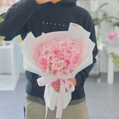 Twenty Soft Pink Roses in White Paper Bouquet